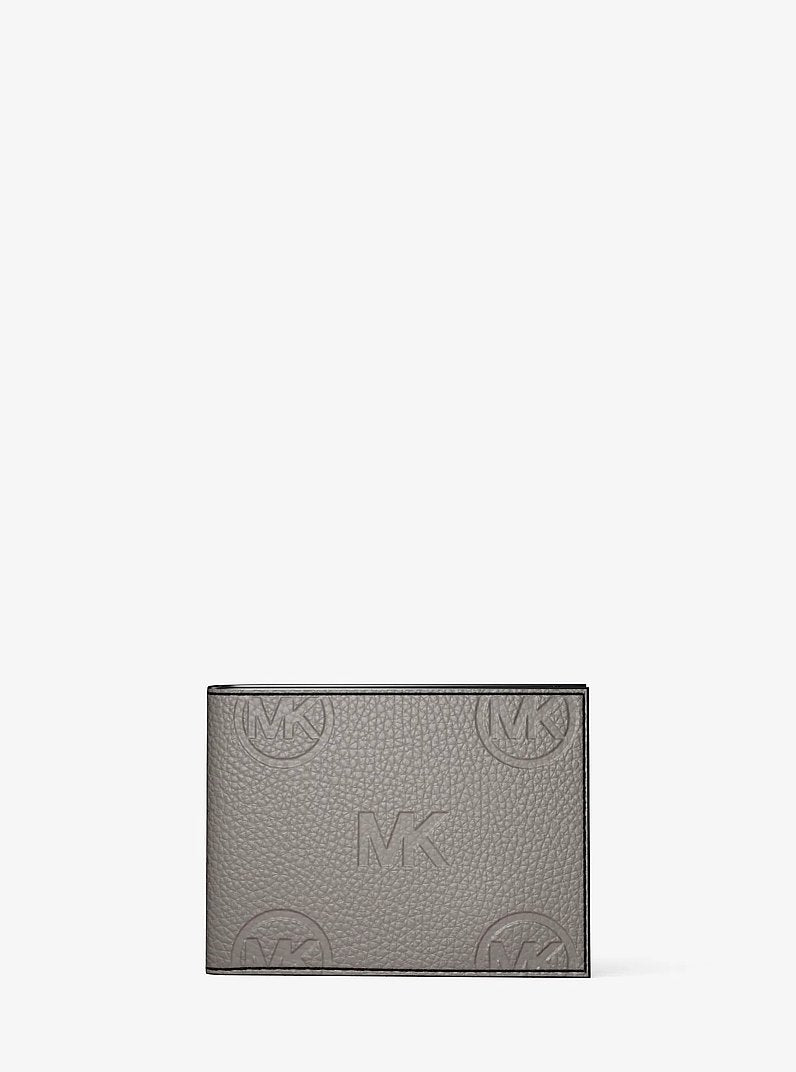 Michael Kors Cooper Logo Debossed Billfold Wallet With Passcase Pearl Grey in Pearl Grey – Flat-Lay Lifestyle View