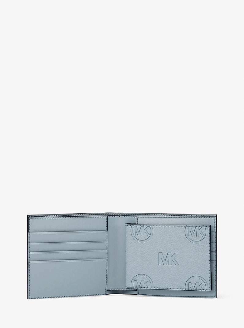 Michael Kors Cooper Logo Debossed Billfold Wallet With Passcase Pale Ocean in Pale Ocean – Exterior Closed View