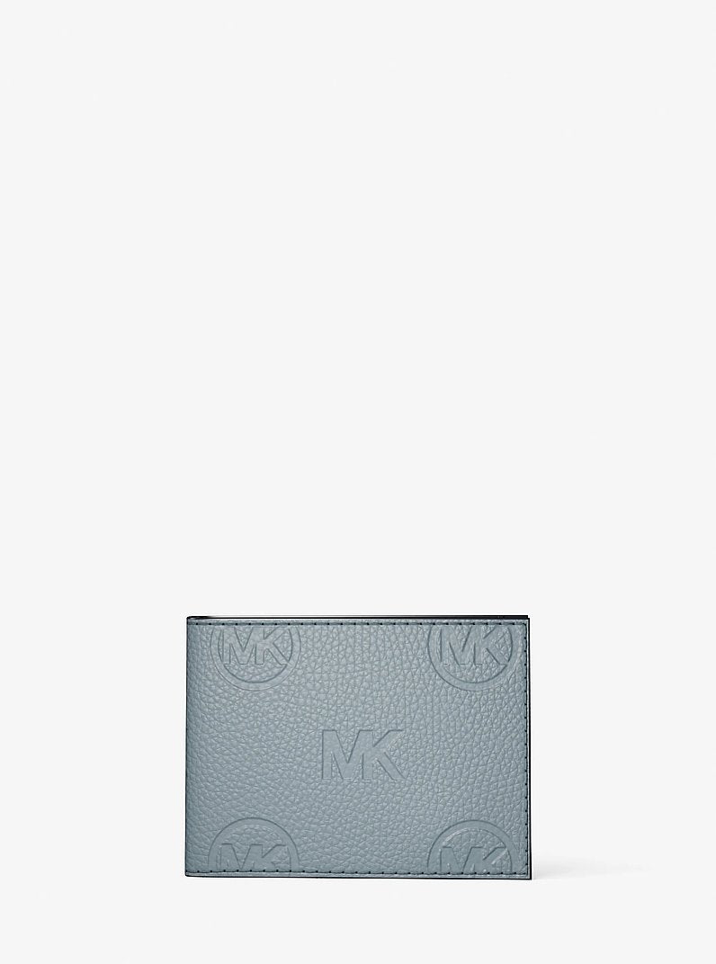 Michael Kors Cooper Logo Debossed Billfold Wallet With Passcase Pale Ocean in Pale Ocean – Flat-Lay Lifestyle View