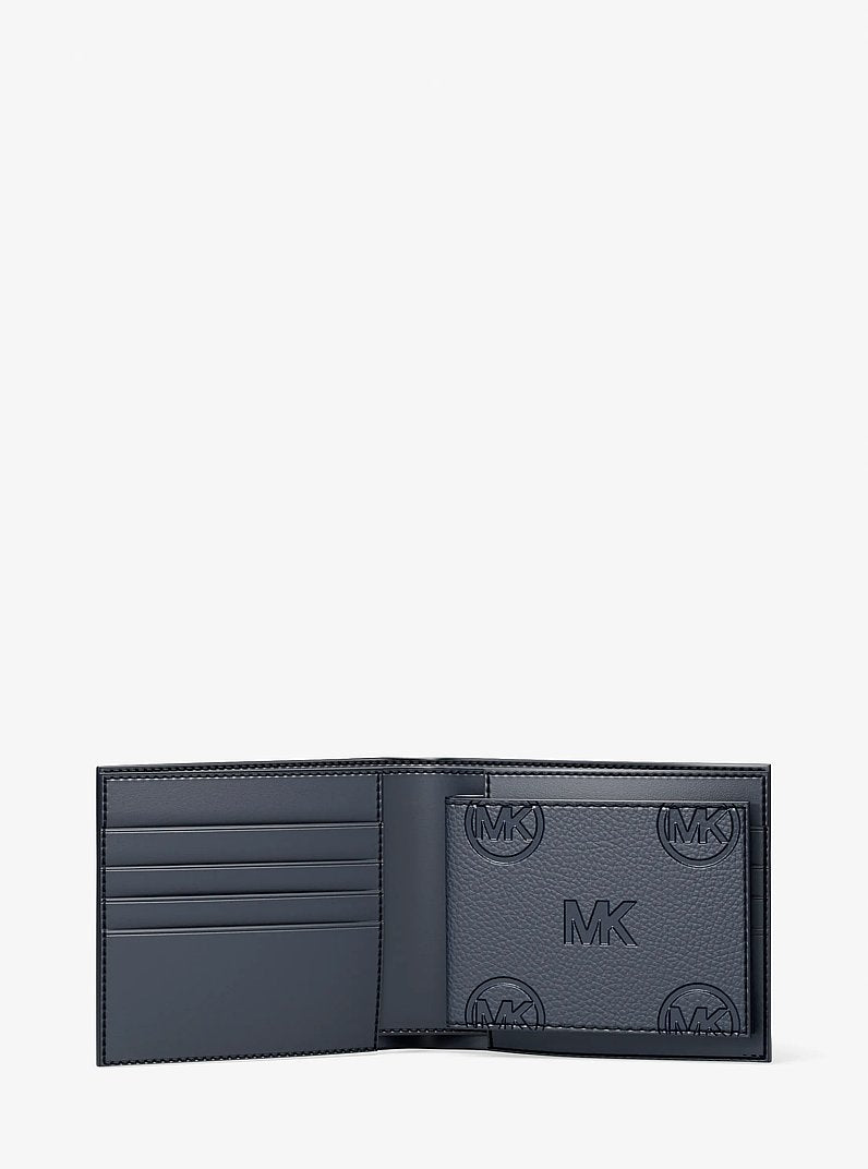 Michael Kors Cooper Logo Debossed Billfold Wallet With Passcase Navy in Navy – Exterior Closed View