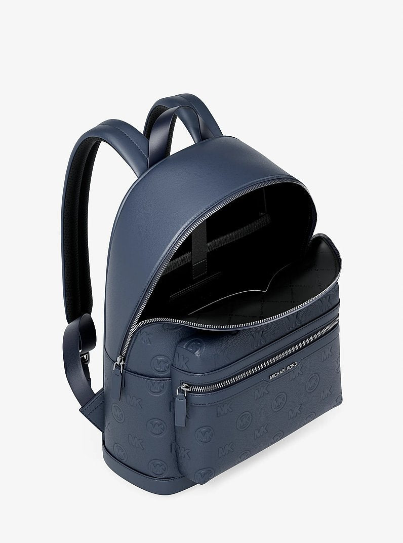 Michael Kors Cooper Medium Logo Debossed Dome Backpack Navy in Navy – Side Angle View