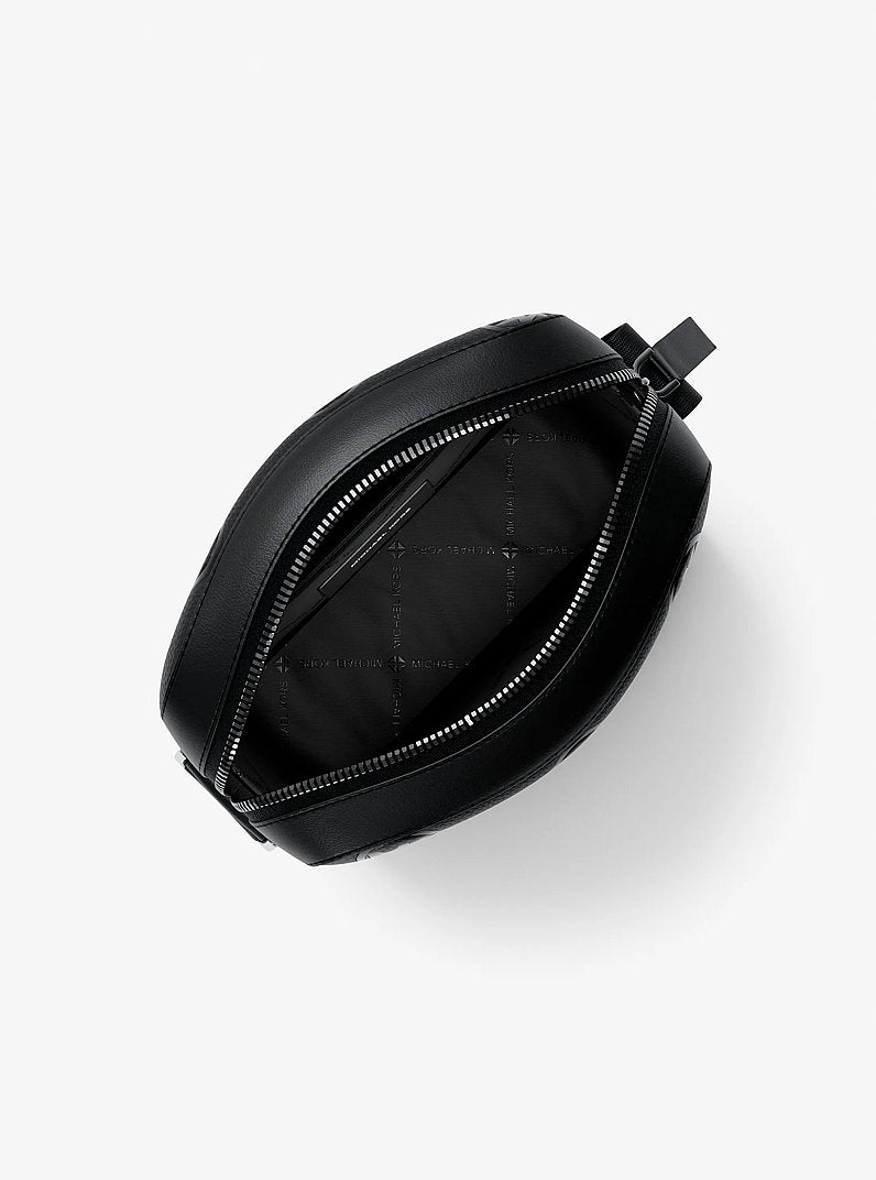 Michael Kors Cooper Logo Debossed Flight Bag Black in Black – Side Angle View