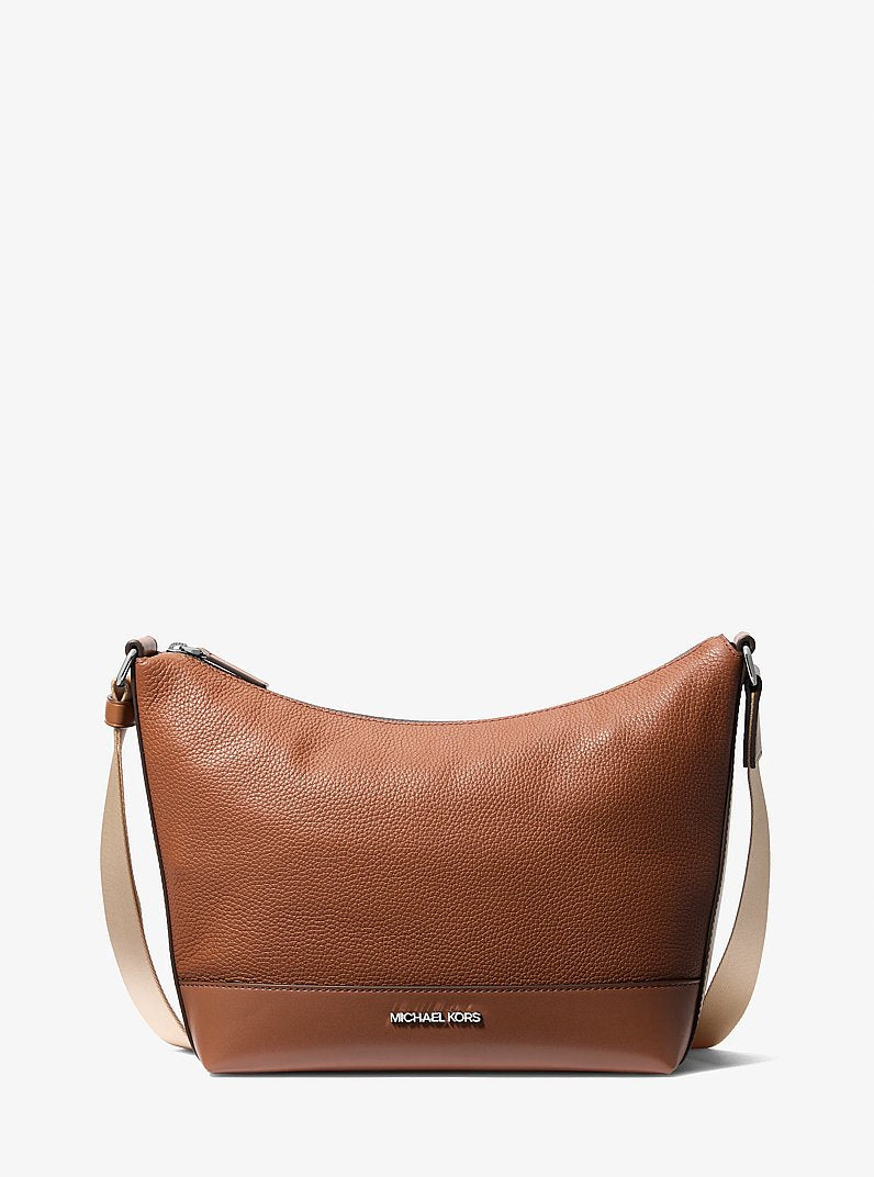 Michael Kors Cooper Pebbled Leather Crescent Bag Luggage in Luggage – Front View