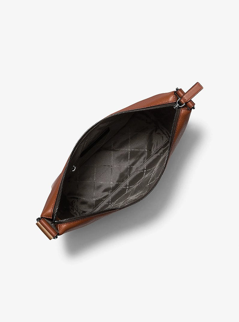 Michael Kors Cooper Pebbled Leather Crescent Bag Luggage in Luggage – Front View
