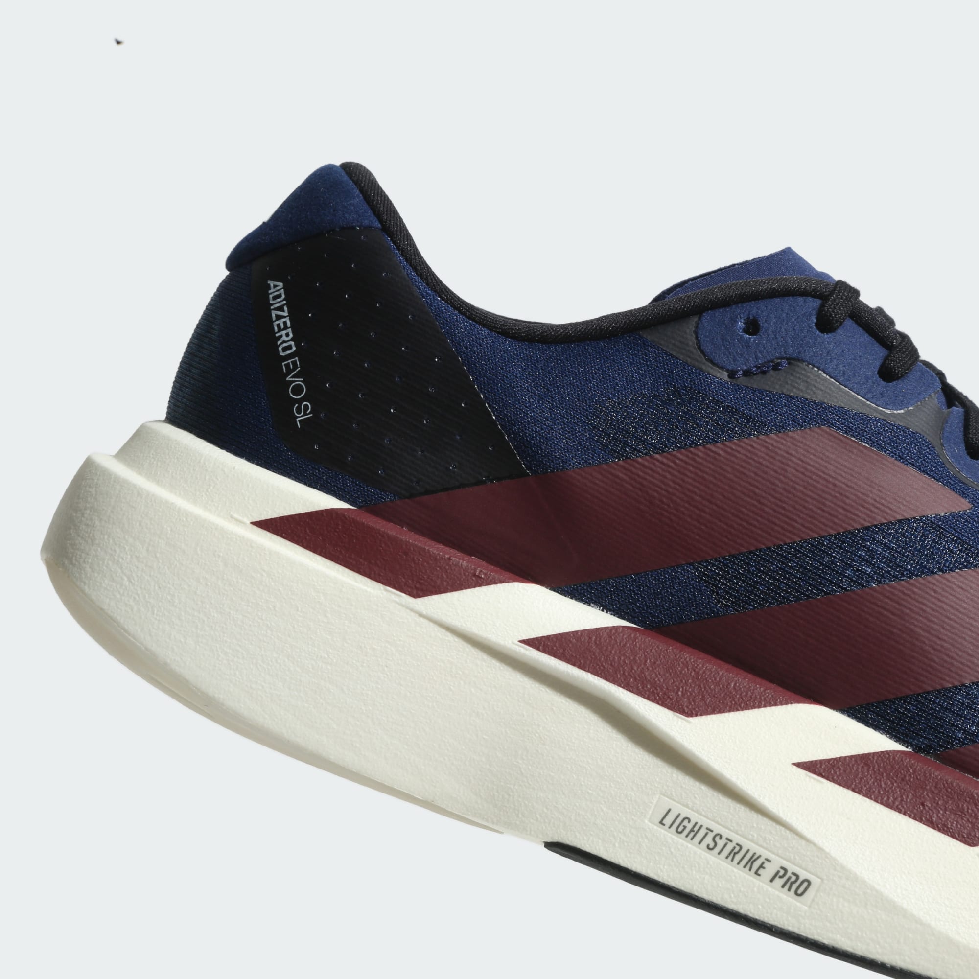 Adidas Adizero Evo SL running shoes in Dark Blue Red Shadow