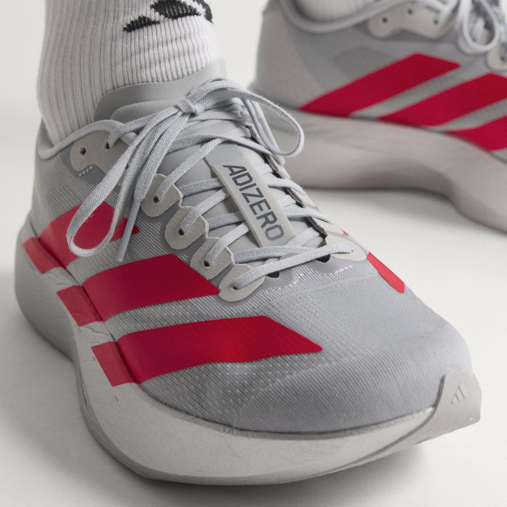 Adidas Adizero Evo SL running shoes in Silver Metallic Lucid Red
