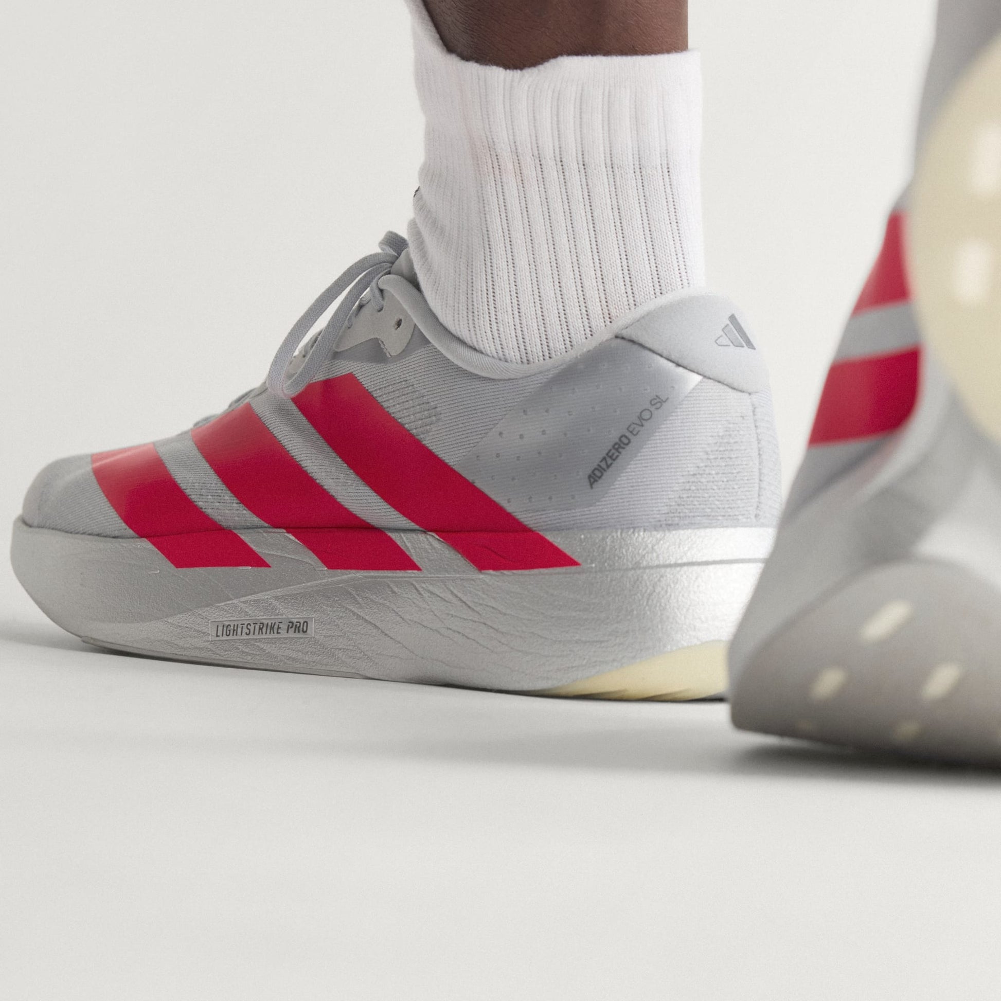 Adidas Adizero Evo SL running shoes in Silver Metallic Lucid Red