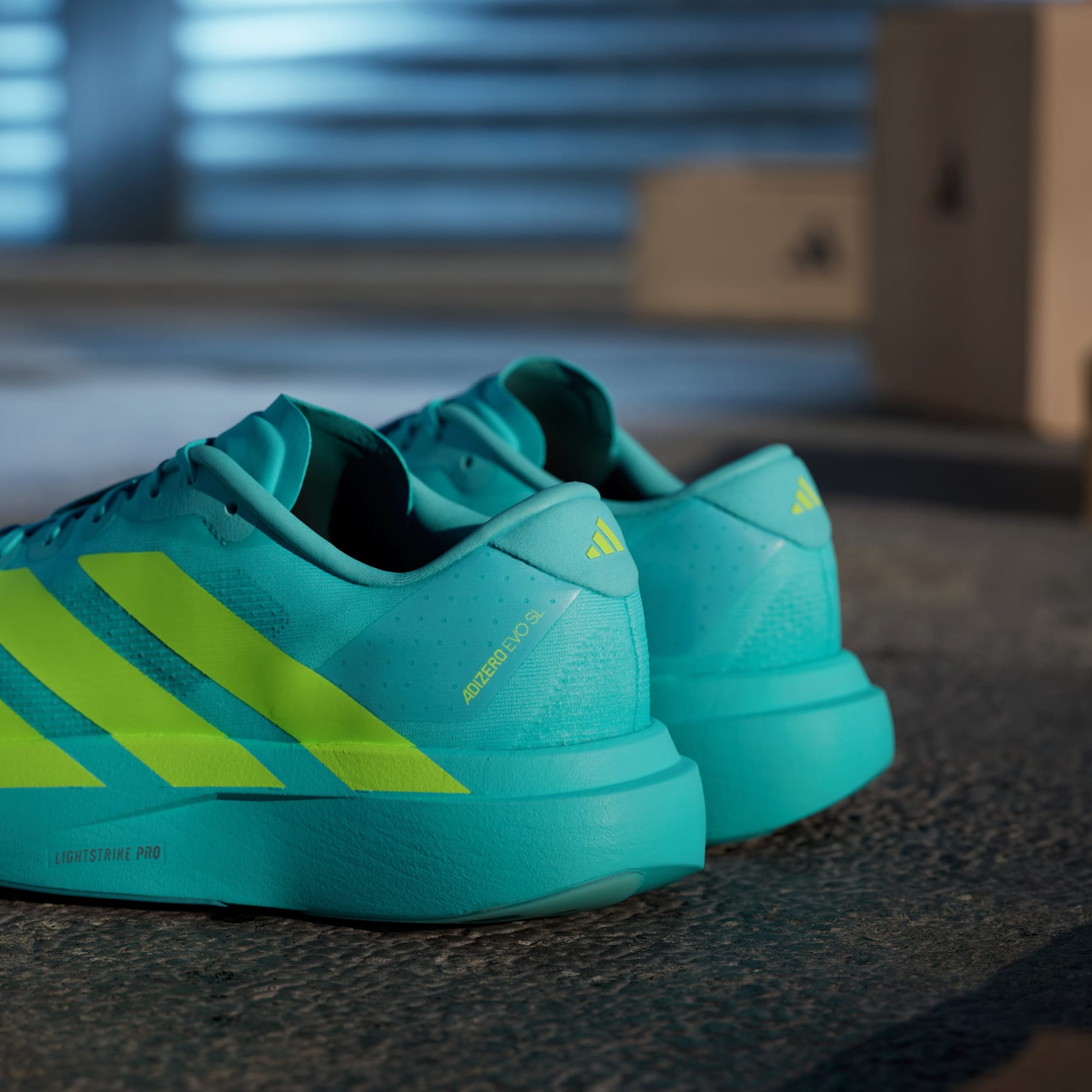 Adidas Adizero Evo SL running shoes in Flash Aqua Lucid Lemon