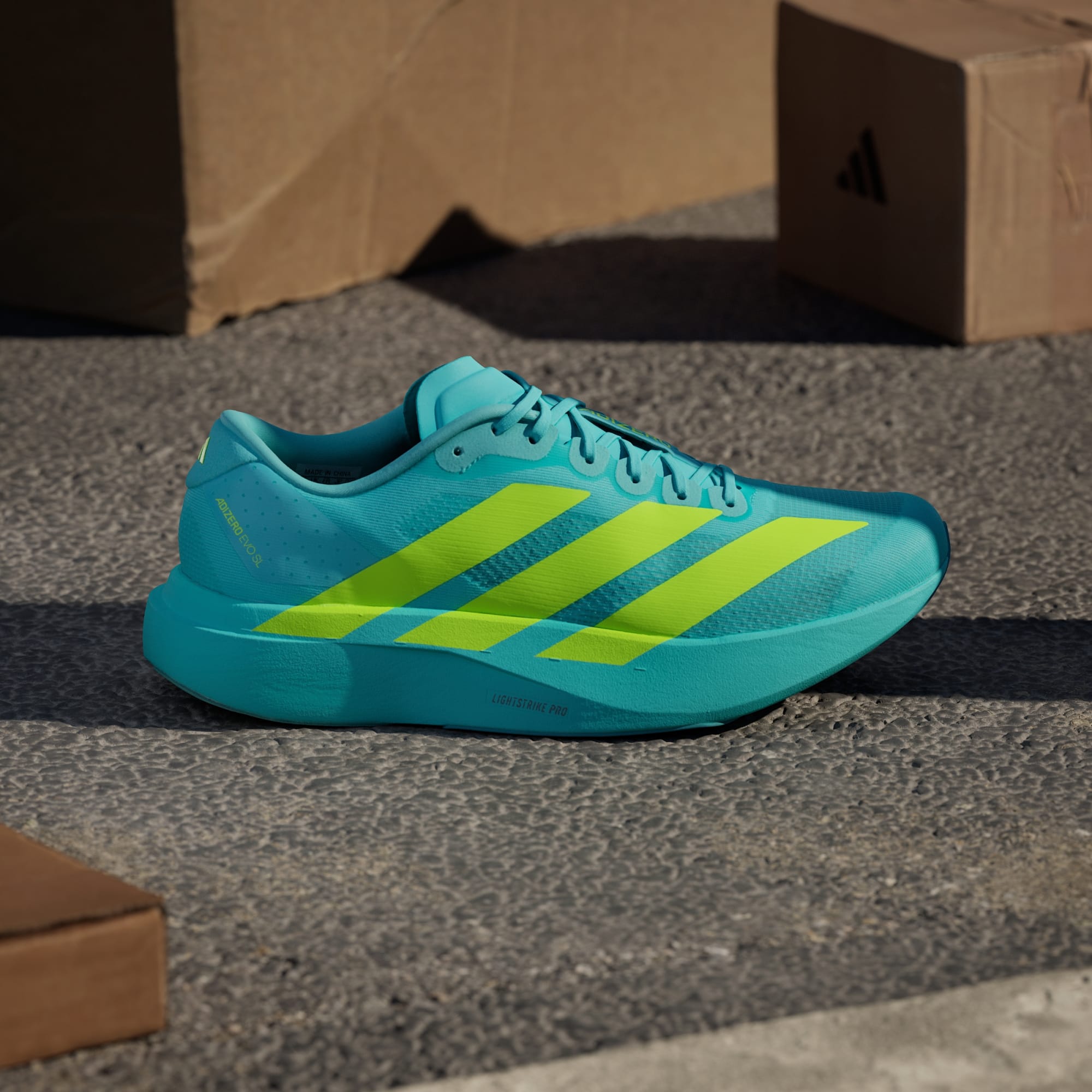 Adidas Adizero Evo SL running shoes in Flash Aqua Lucid Lemon