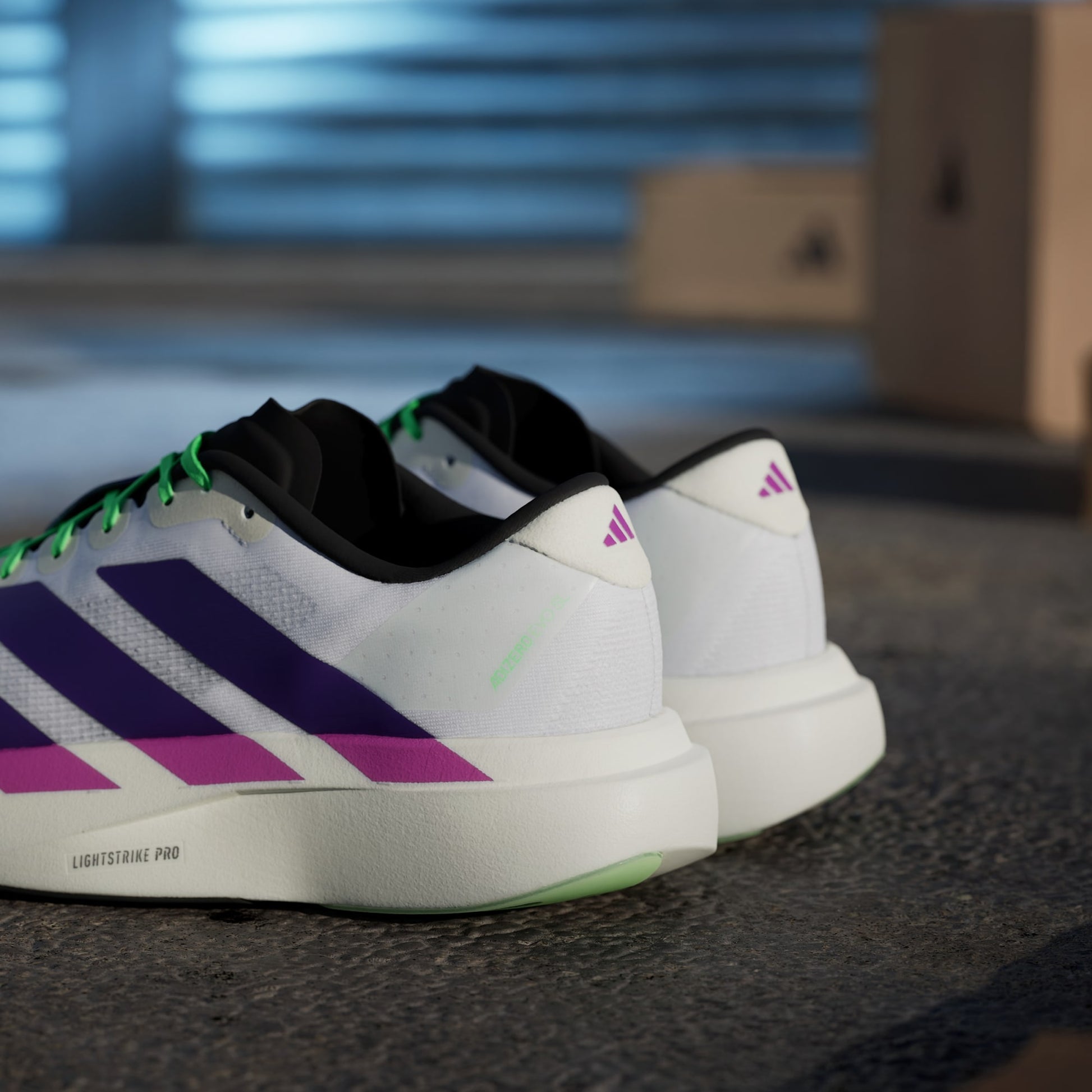 Adidas Adizero Evo SL running shoes in Collegiate Purple Lime Burst