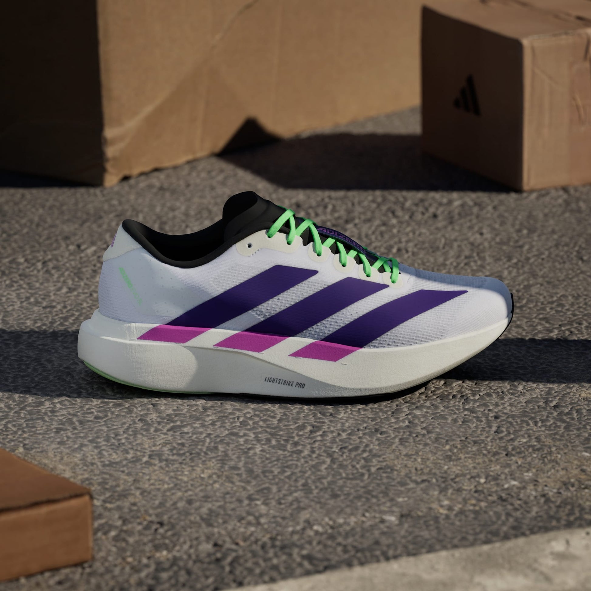 Adidas Adizero Evo SL running shoes in Collegiate Purple Lime Burst