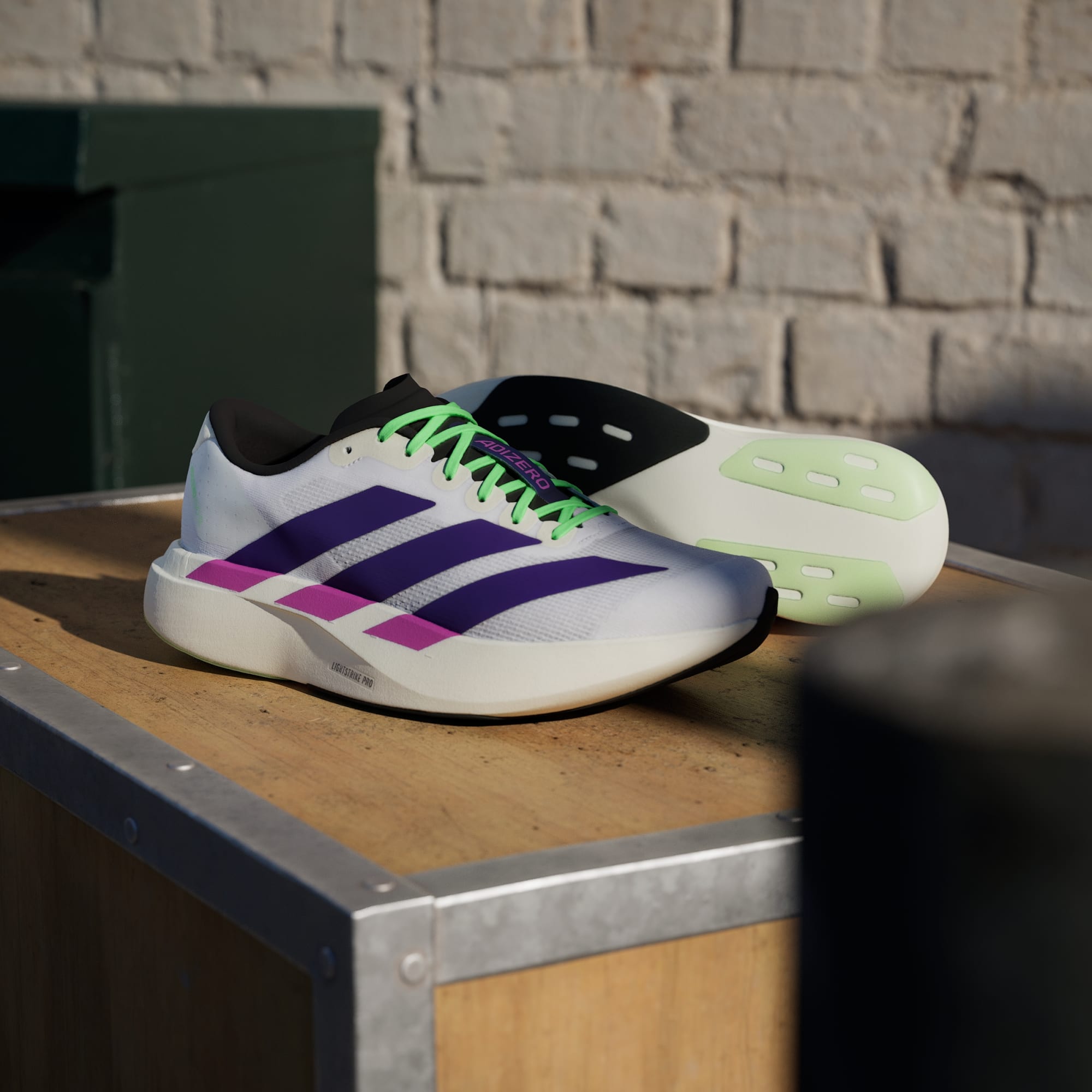 Adidas Adizero Evo SL running shoes in Collegiate Purple Lime Burst