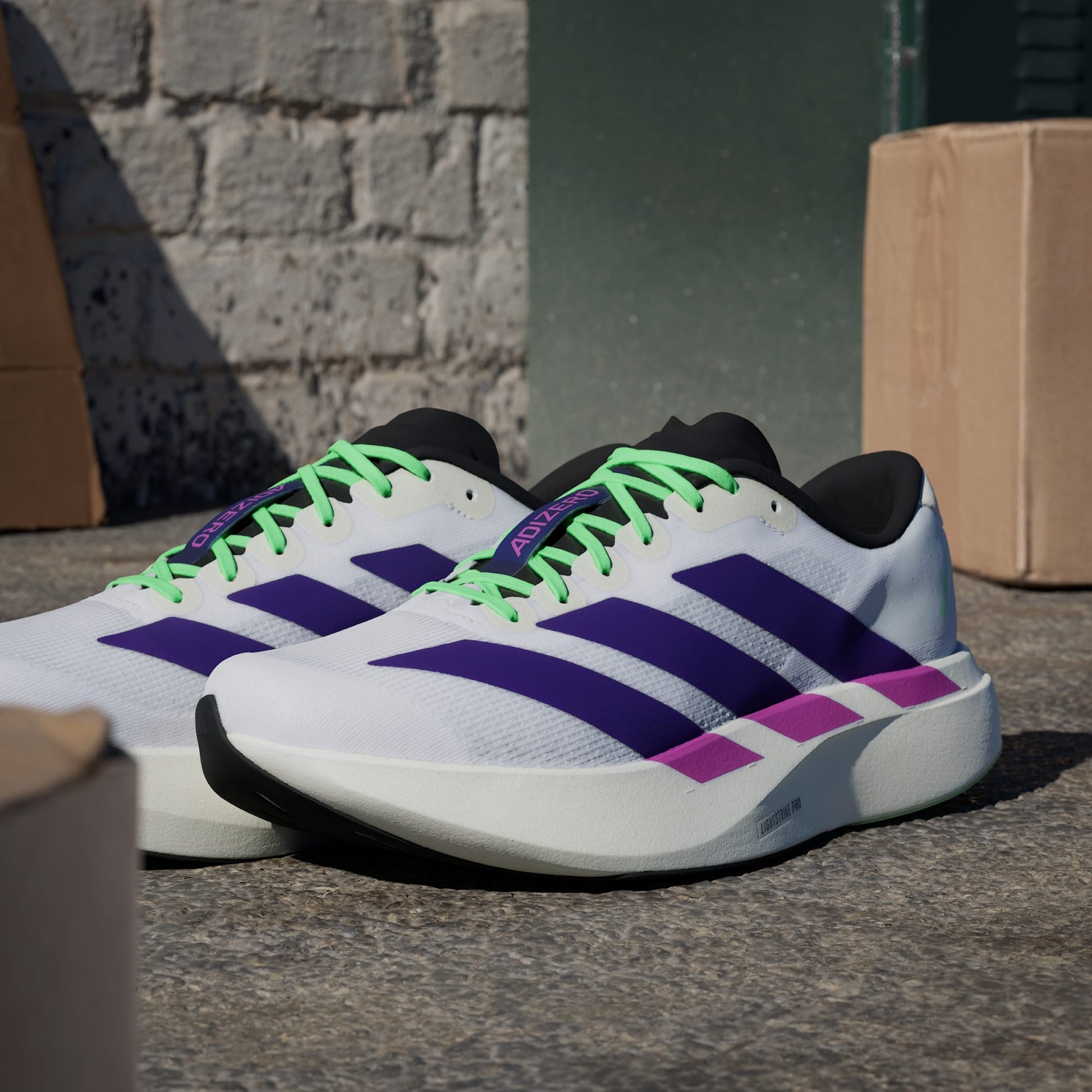 Adidas Adizero Evo SL running shoes in Collegiate Purple Lime Burst