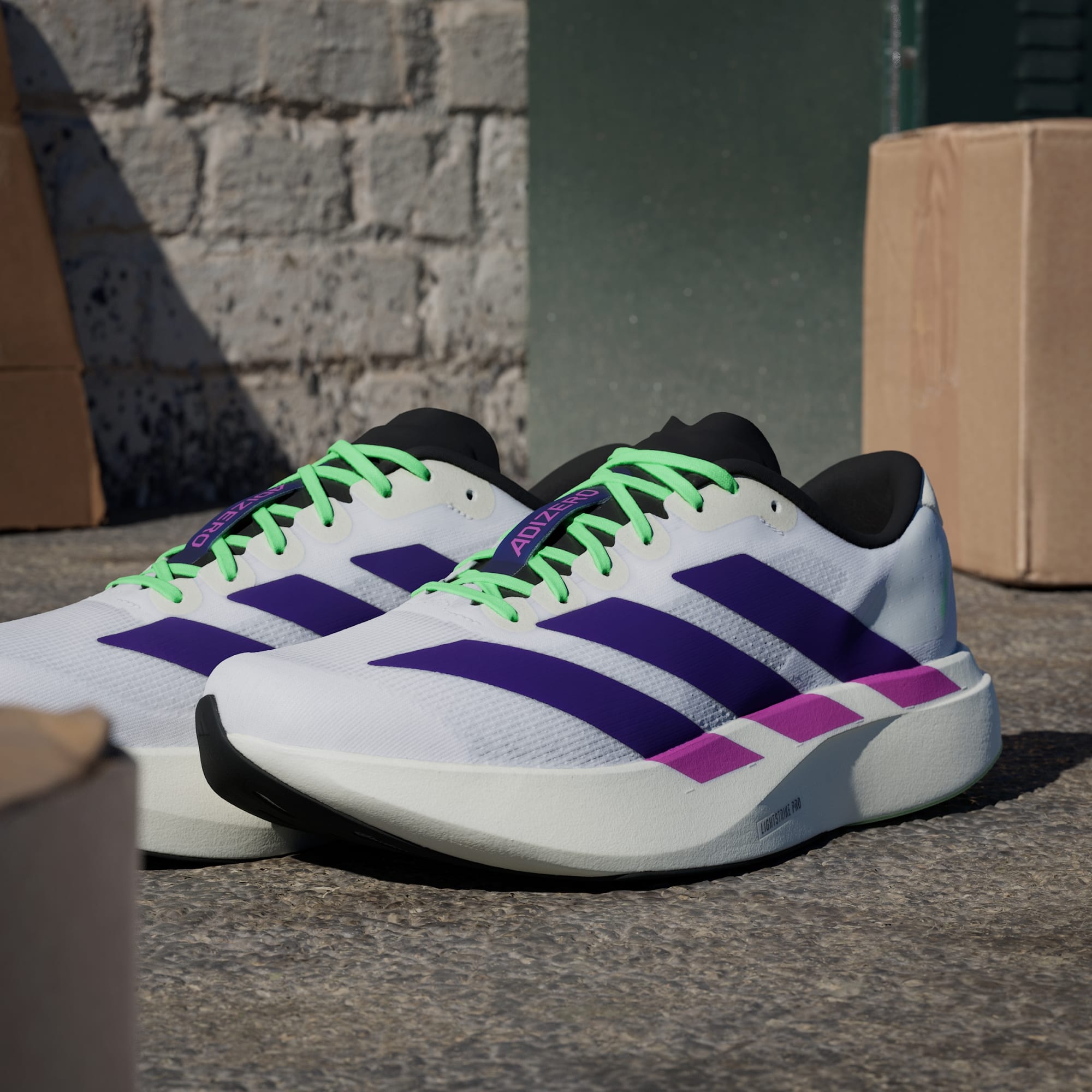 Adidas Adizero Evo SL running shoes in Collegiate Purple Lime Burst