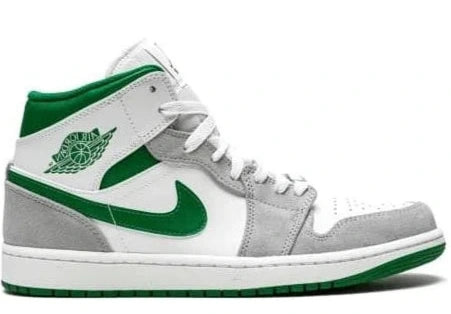 Gray and green sneaker with a prominent logo on a white background