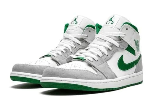 Gray and green sneaker with a prominent logo on a white background