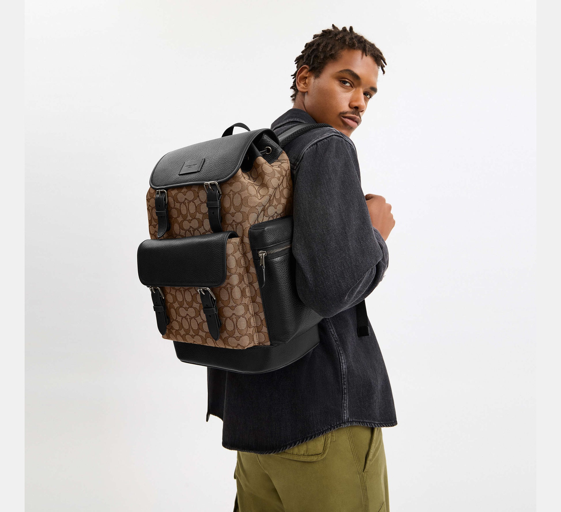 Coach Sprint Backpack In Signature Jacquard Tan/Black - Front View | Authentic Coach Luxury Accessories