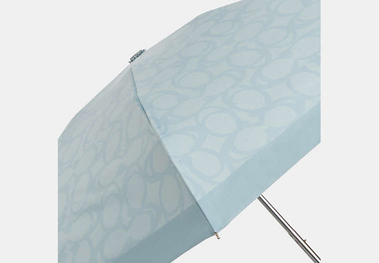 Coach Uv Protection Mini Umbrella In Sketch Signature Print Silver/Ice Blue - Front View | Authentic Coach Luxury Accessories
