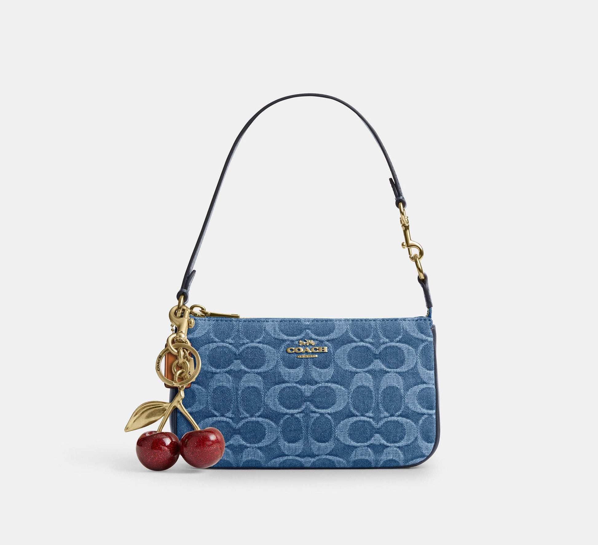 Coach Nolita 19 in Signature Denim in Gold/Indigo - On Shoulder View