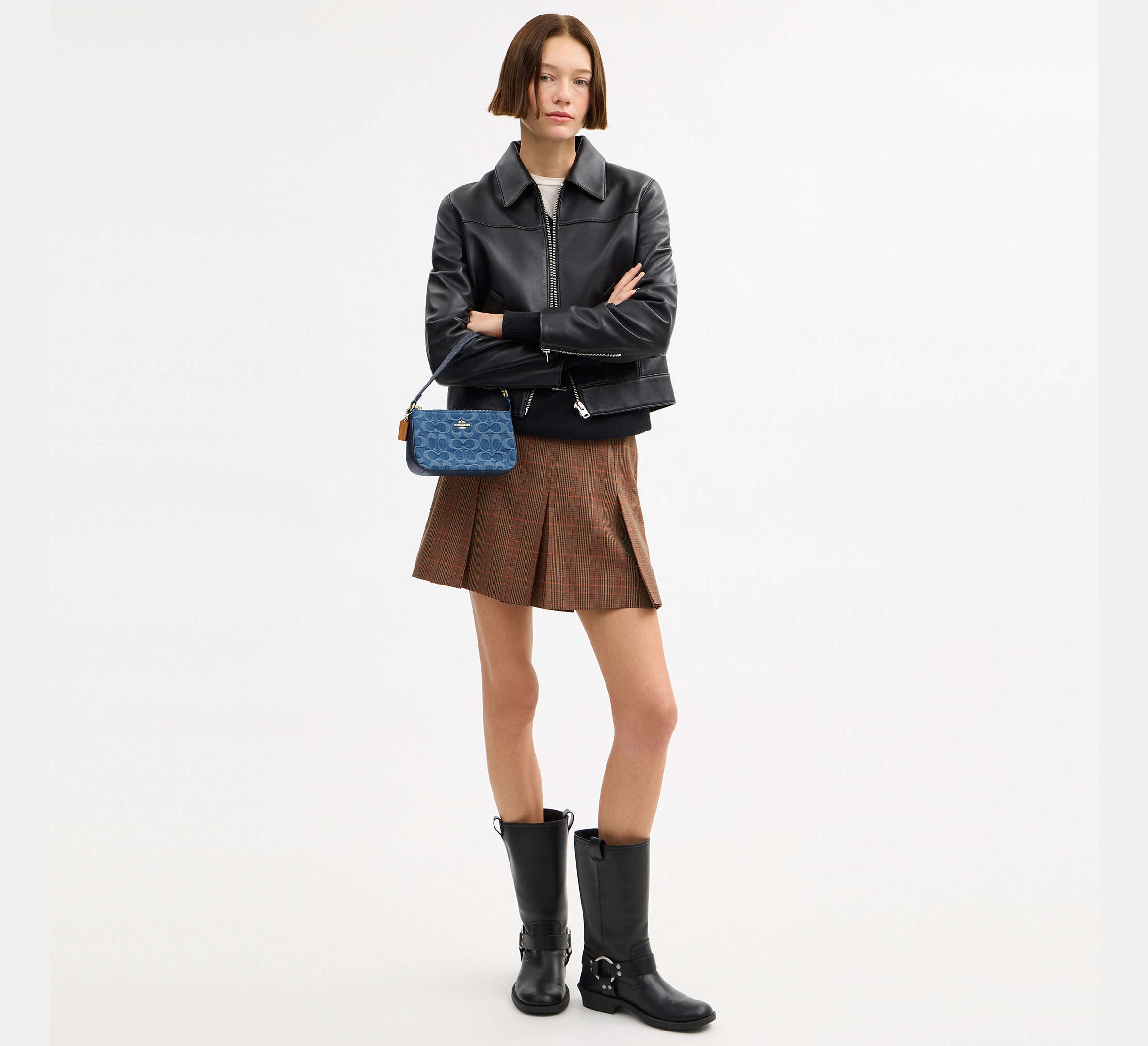 Coach Nolita 19 in Signature Denim in Gold/Indigo - On Model
