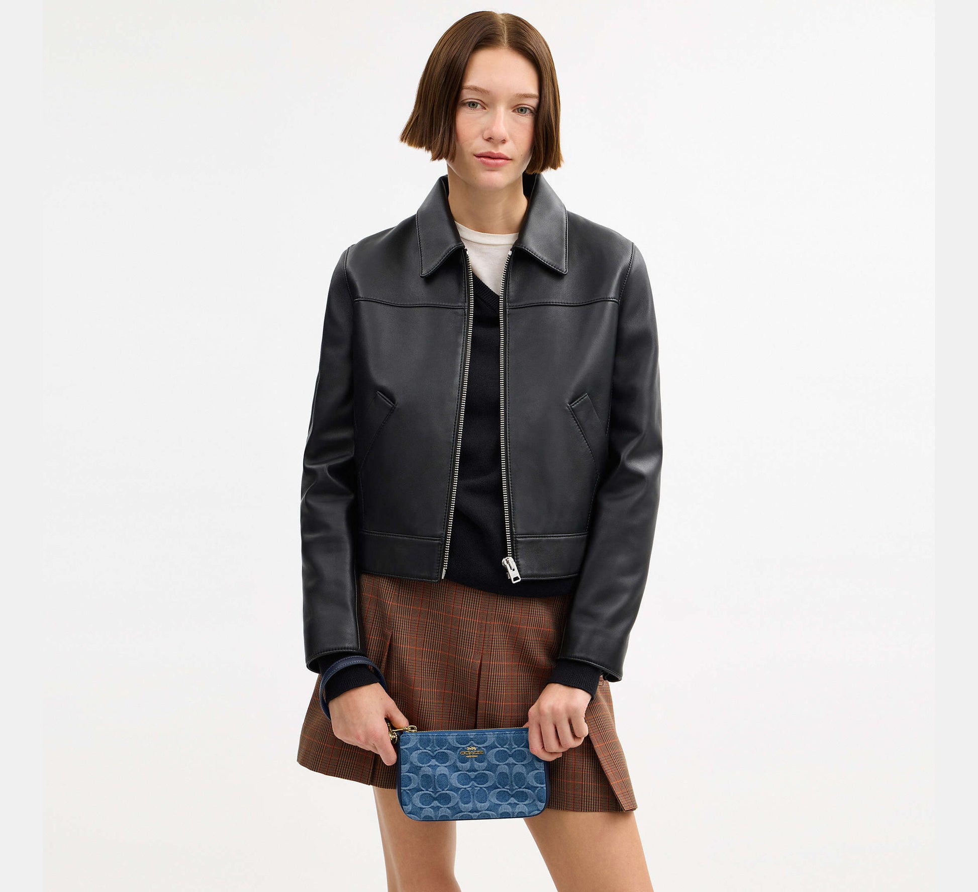 Coach Nolita 19 in Signature Denim in Gold/Indigo - On Model Side