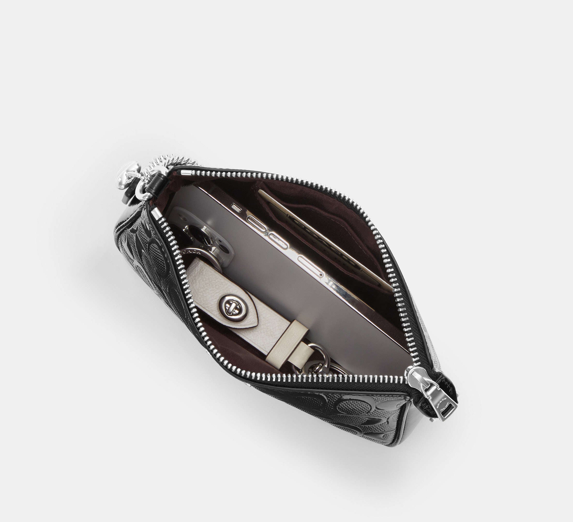 Coach Nolita 19 in Signature Leather with Heart Charm in Patent Silver/Black - Lifestyle
