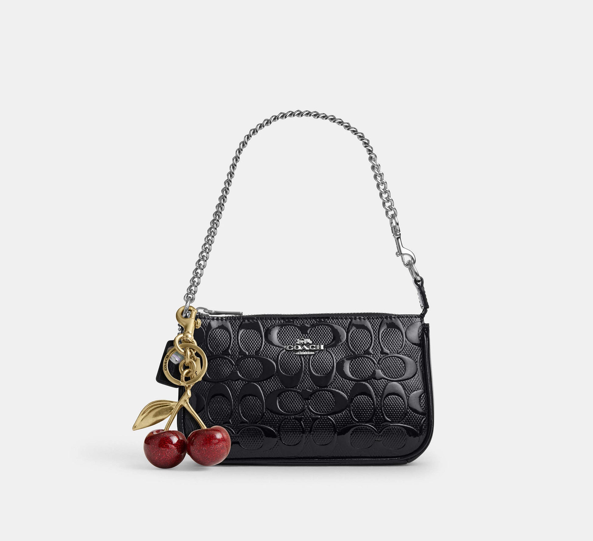 Coach Nolita 19 in Signature Leather with Heart Charm in Patent Silver/Black - On Shoulder View