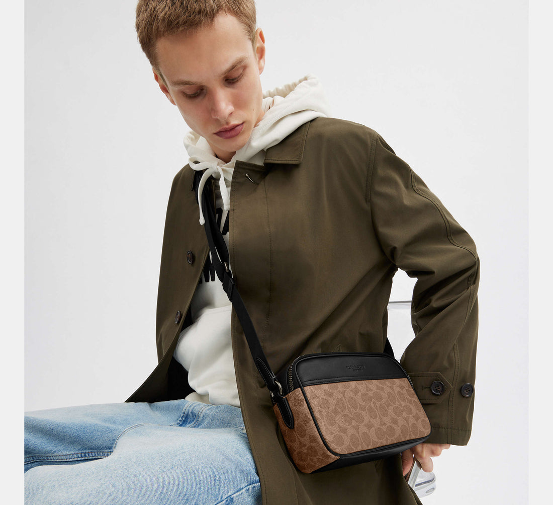 Coach Graham Crossbody Bag In Signature Canvas Tan/Black in brown - Front View | Authentic Coach Luxury Accessories