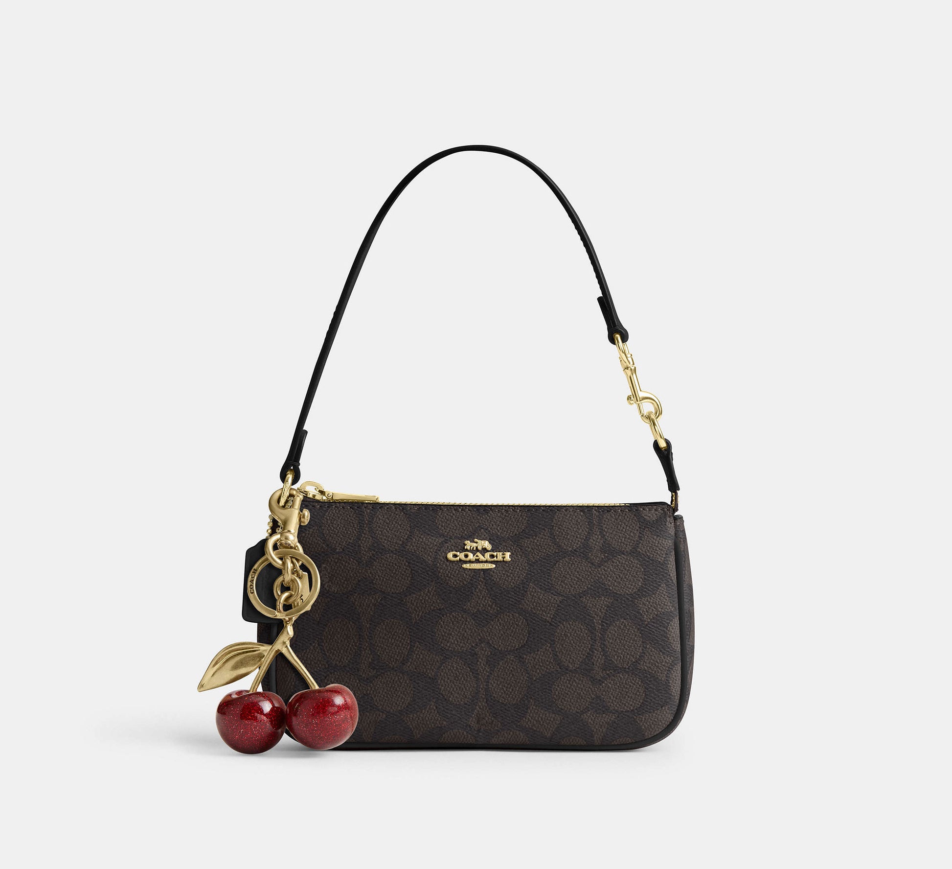 Coach Nolita 19 in Signature Canvas in Gold/Walnut/Black - On Shoulder View